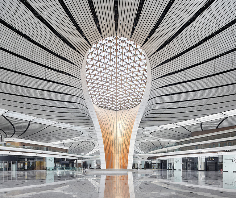 Beijing Daxing International Airport featuring Zaha Hadid–inspired futuristic architecture with sweeping curves, radial geometry, and advanced digital design innovation.